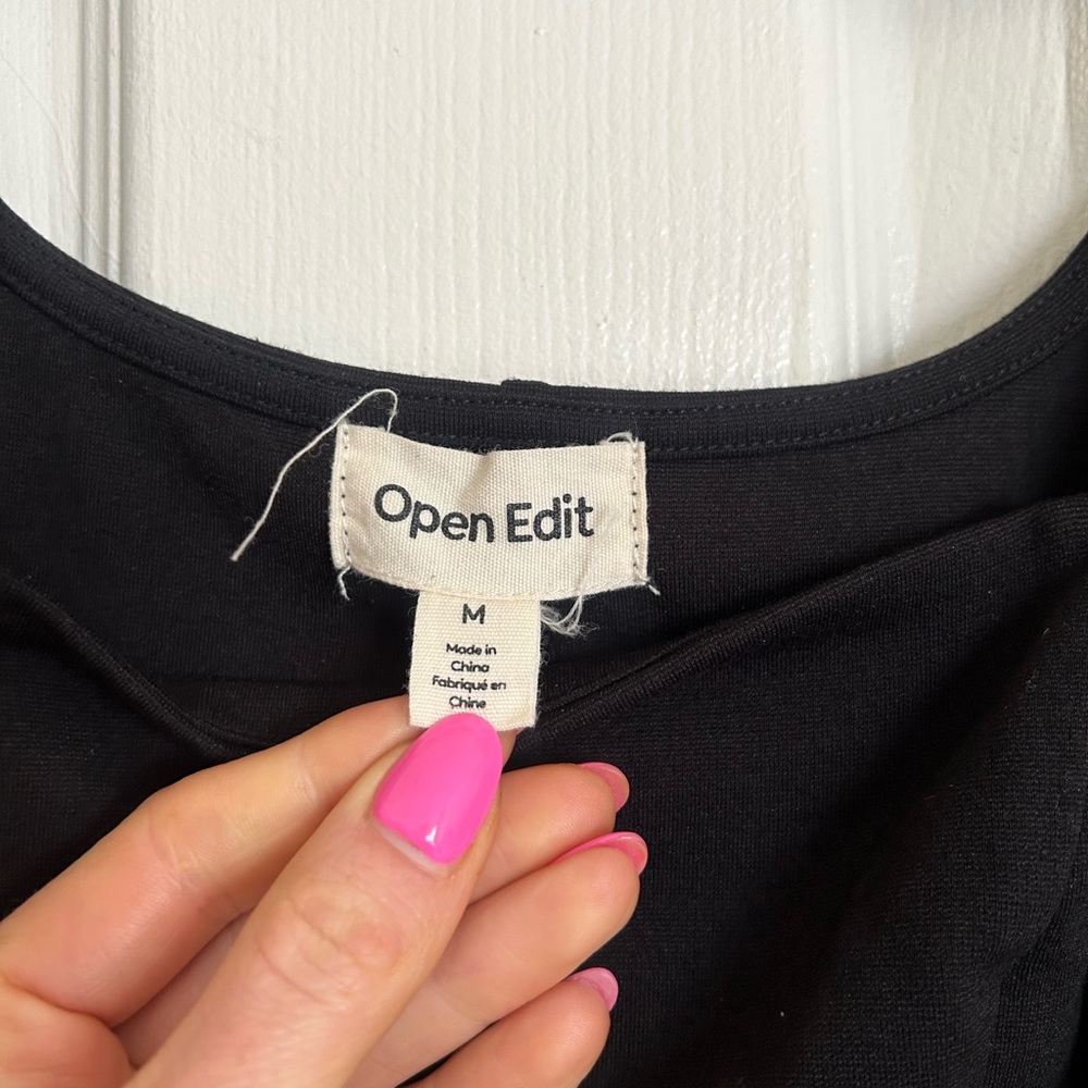 Open Edit
Sleeveless Knit Cutout Dress
Color: Black
Size: M